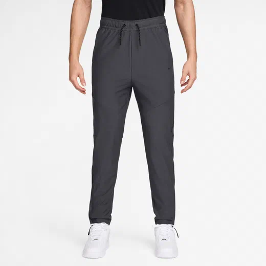 Pantalon survêtement Nike Tech Woven gris