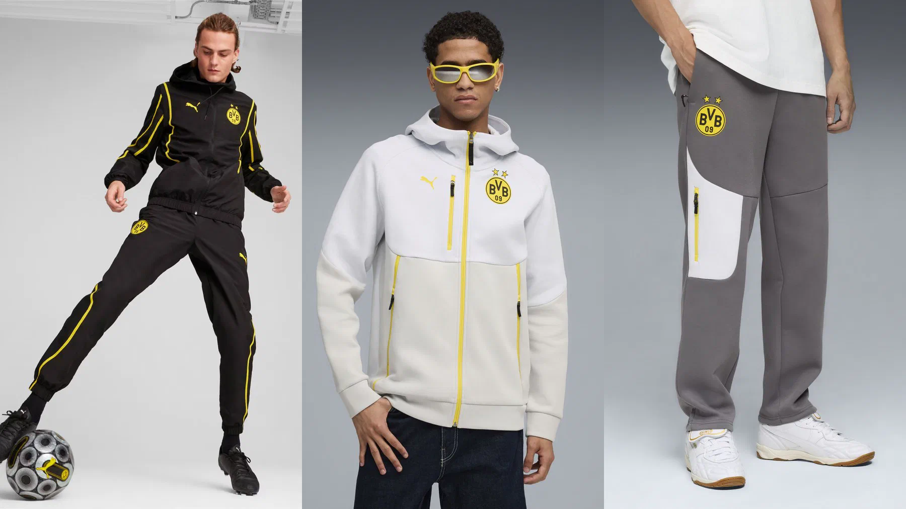 Tenue d'avant-match noire à liserés jaunes, veste à capuche PUMATECH blanche et pantalon gris du Borussia Dortmund portés