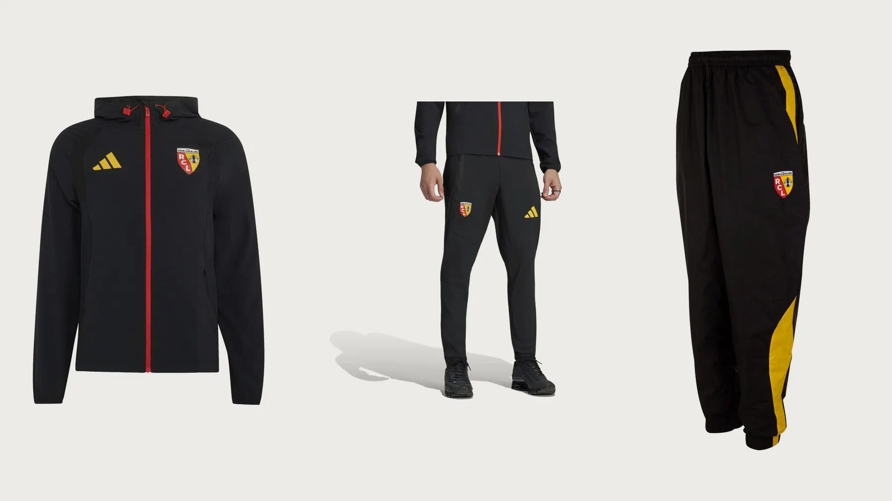 Coupe-vent RC Lens adidas noir à zip rouge, pantalon Travel noir porté et pantalon tissé Puma noir à bande jaune